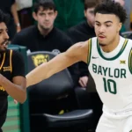 BAYLOR PREVAILS --- Arizona State guard Maurice Odum looks to pass against Baylor'S Isaac Williams during the second half of Saturday's Big 12 Conference game at Foster Pavilion. The Bears upended the visiting Sun Devils, 73-68. (Chris Jones-Imagn Images)